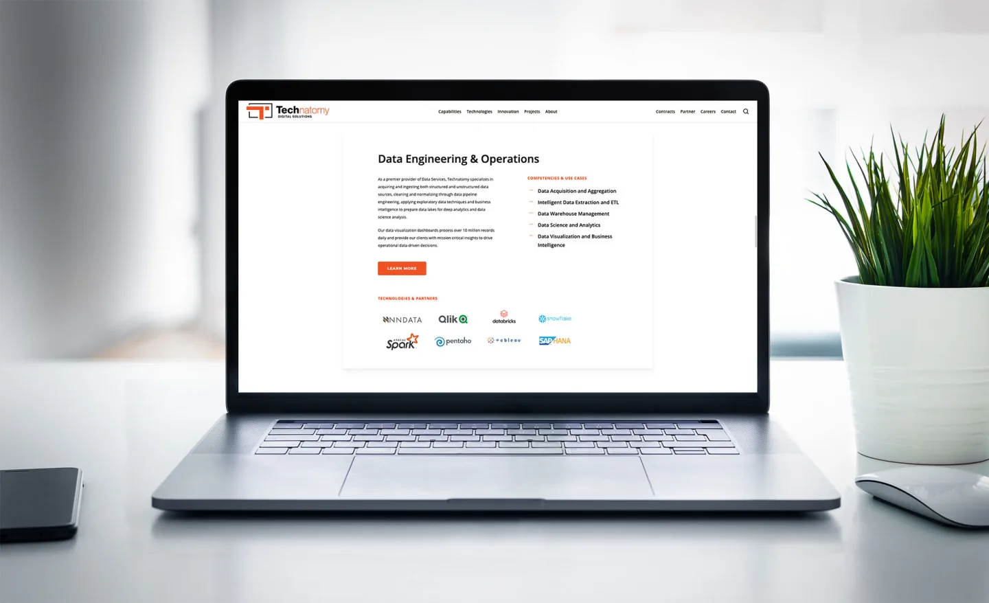 Technatomy Data Engineering and Operations page displayed on a laptop
